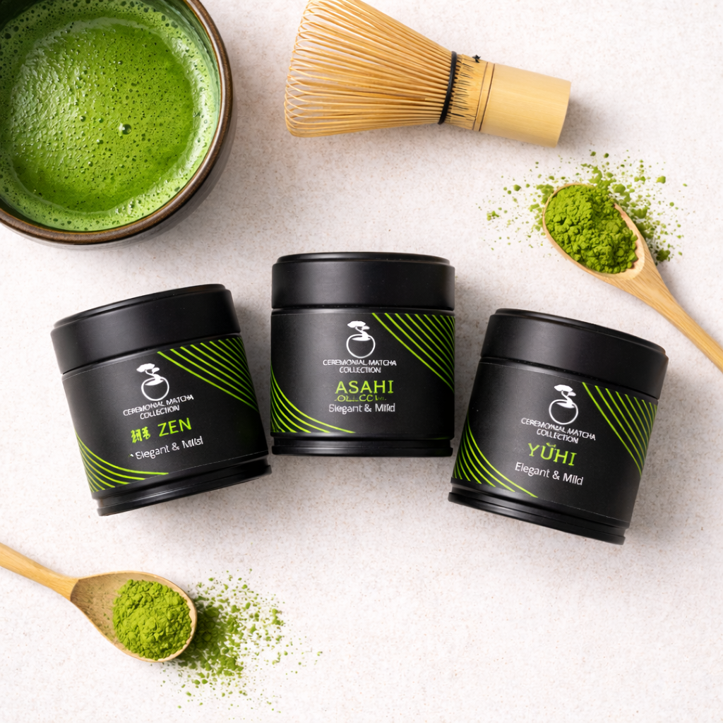 Three ceremonial matcha tea tins with bamboo whisk, chawan and vibrant green matcha powder overhead