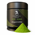 Asahi ceremonial matcha tin with a mound of vibrant green matcha powder on a white background, elegant and mild Japanese matcha from Kyoto