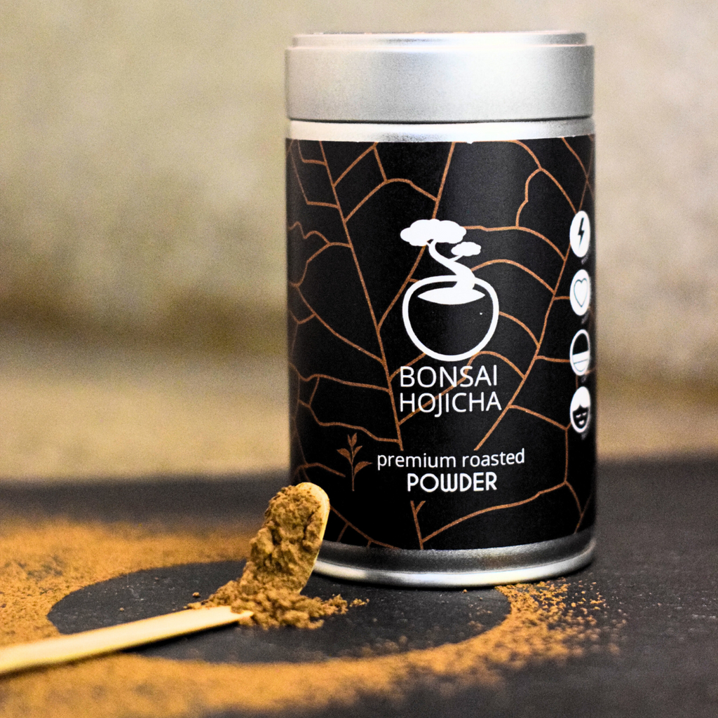 Bonsai Hojicha premium roasted powder can with wooden spoon and roasted brown hojicha powder on a rustic background