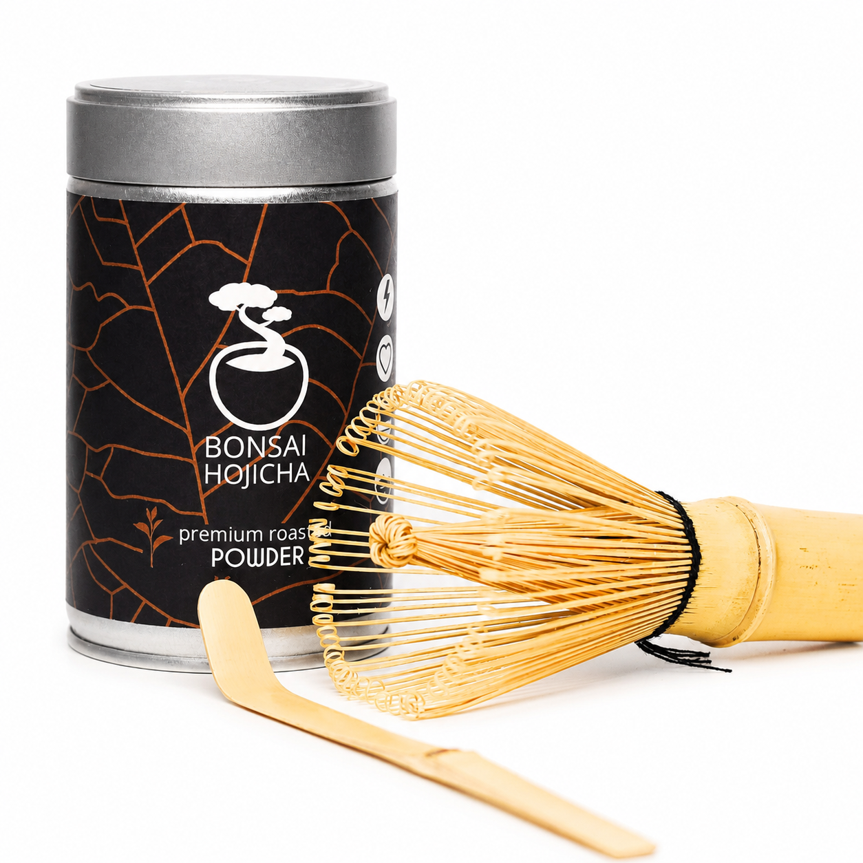 Bonsai Hojicha starter kit — roasted hojicha tin with bamboo whisk (chasen) and scoop (chashaku) on a white background, complete hojicha set