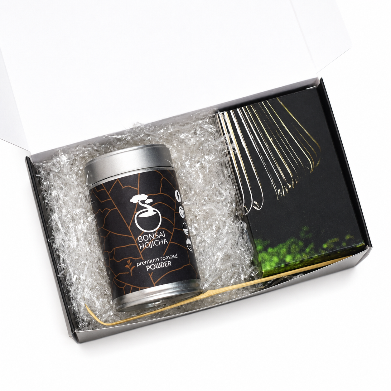 Bonsai Hojicha starter kit gift box with roasted hojicha tin, bamboo whisk and scoop on white, premium roasted tea set for beginners