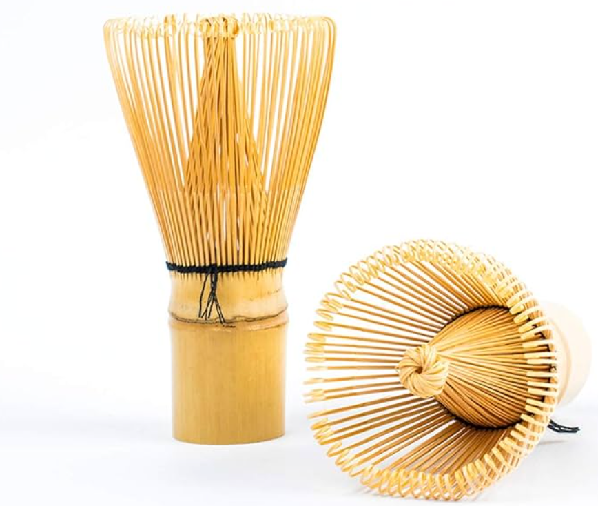 Bamboo matcha whisk set with one whisk upright and one lying on its side