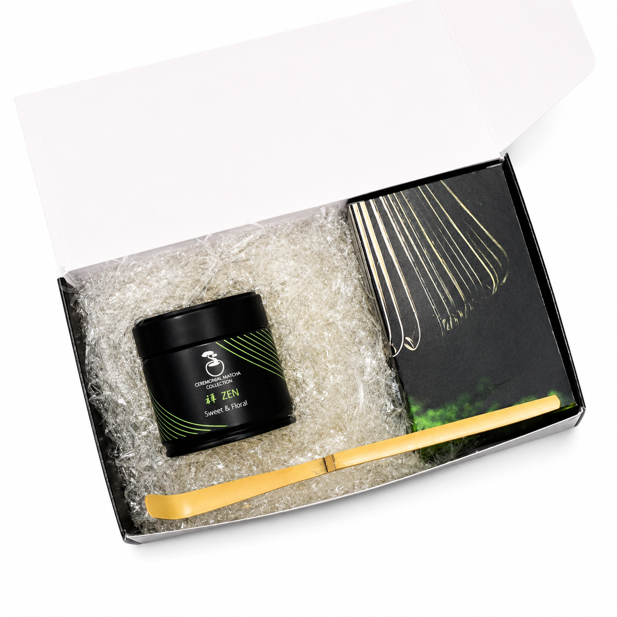 Bonsai Matcha starter kit gift box with Zen ceremonial matcha tin, bamboo whisk and scoop on a white background, complete matcha set for beginners