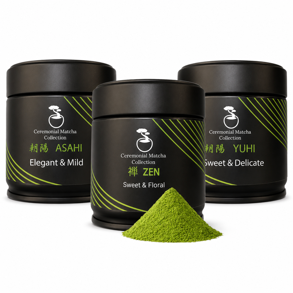 Bonsai Matcha ceremonial trio — Asahi, Zen and Yūhi tins with a mound of bright green matcha powder on white, ceremonial matcha tasting set