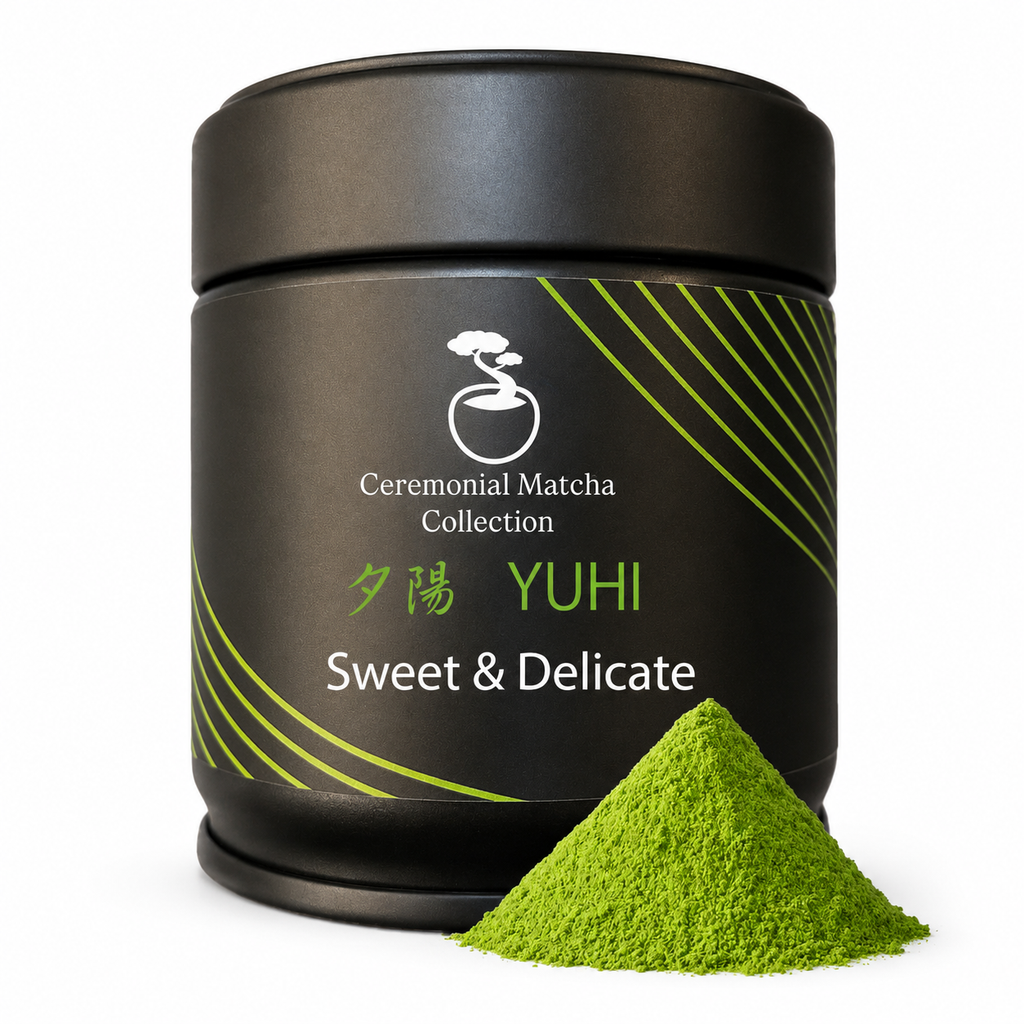 Yūhi ceremonial matcha tin with a mound of vibrant green matcha powder on a white background, sweet and delicate Japanese matcha from Kyoto