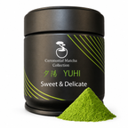 Yūhi ceremonial matcha tin with a mound of vibrant green matcha powder on a white background, sweet and delicate Japanese matcha from Kyoto
